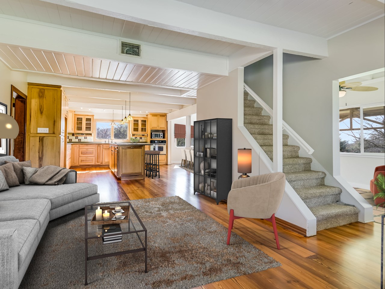 farmhouse interior open living, dining area with walls of windows and peaceful views