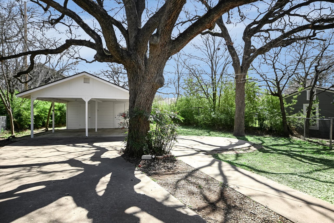 unbelievable! peaeful and private backyard oasis with towering trees & oversized carport