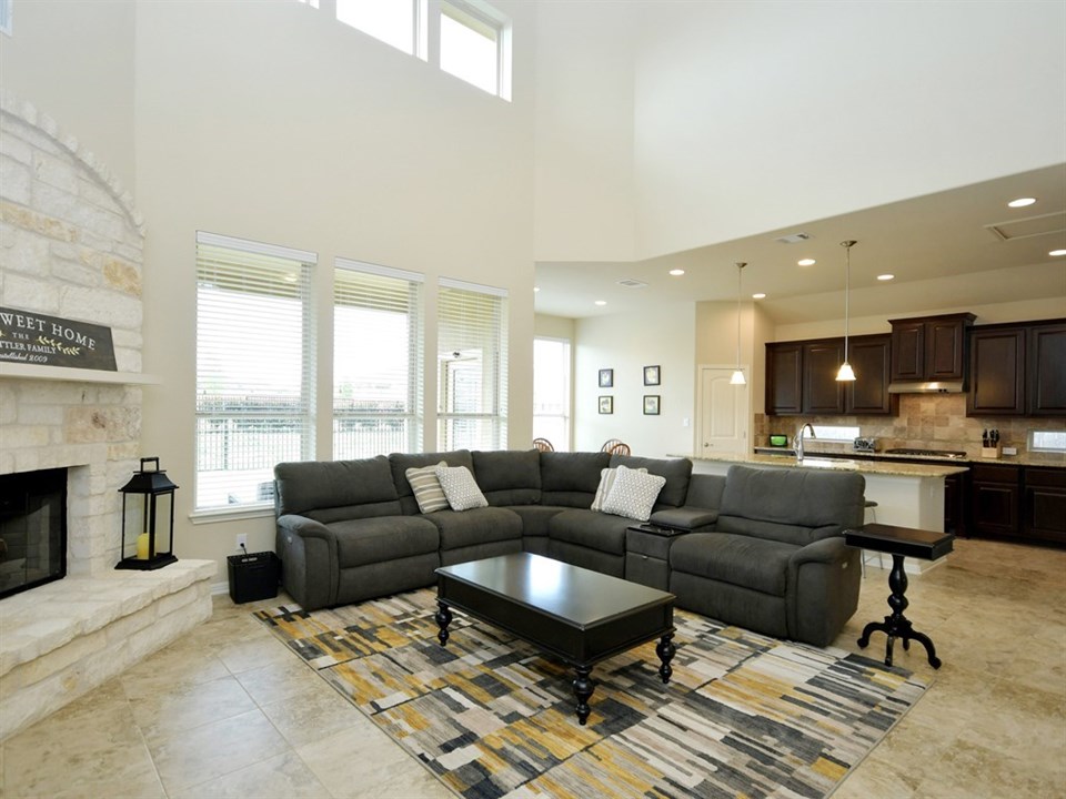 expansive great room open to kitchen and central living area